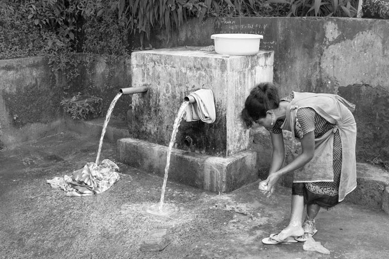 Integrated Solution for Rural Drinking Water Challenges - Spring water running through supply pipes during monsoon season in East Khasi Hill district, Meghalaya